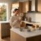 Organized family kitchen at sunrise with clean countertops, a running dishwasher, and a parent enjoying a peaceful morning coffee.